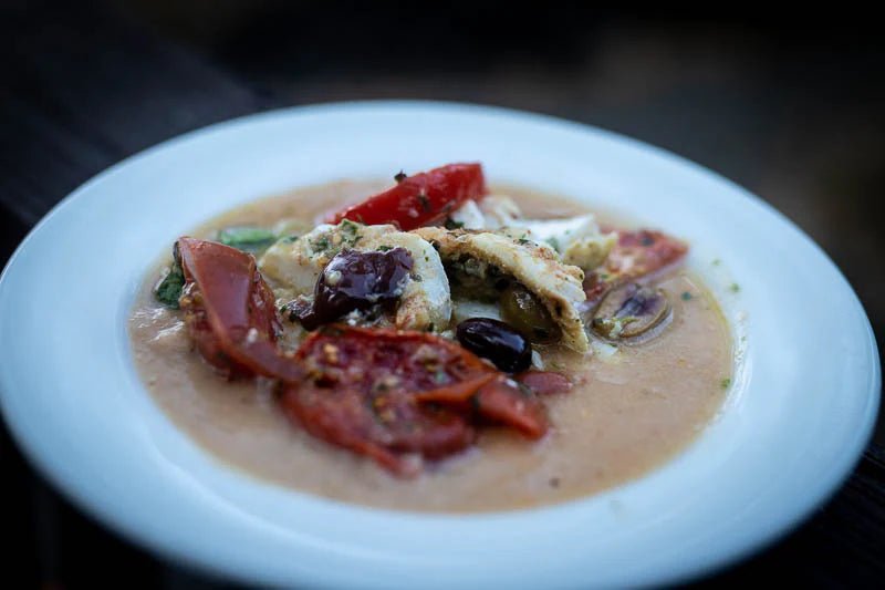 Baked Fish with Tomatoes and Olives on a Bed of Pureed Cassoulet Beans - Rancho Gordo