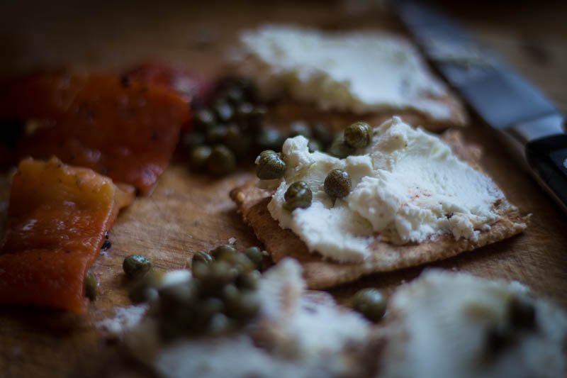 Roasted Pepper, Capers and Goat Cheese on Cracker - Rancho Gordo